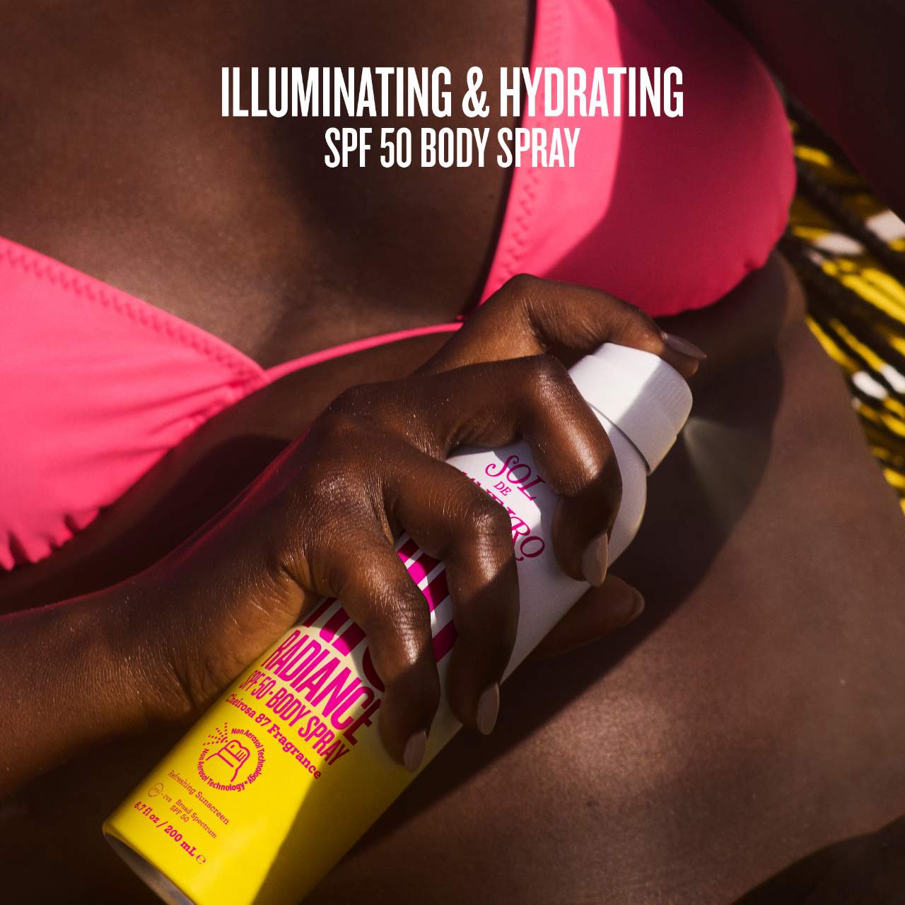 Protector solar corporal en aerosol Rio Radiance™ FPS 50 con niacinamida