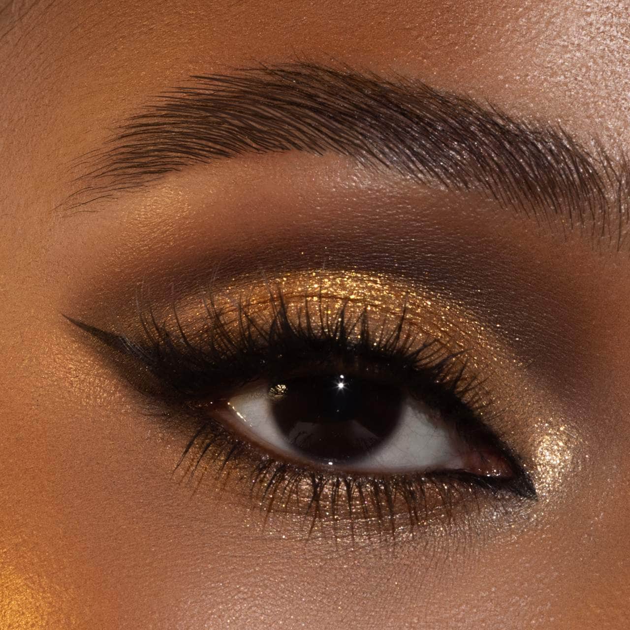 Paleta de sombras de ojos doradas
